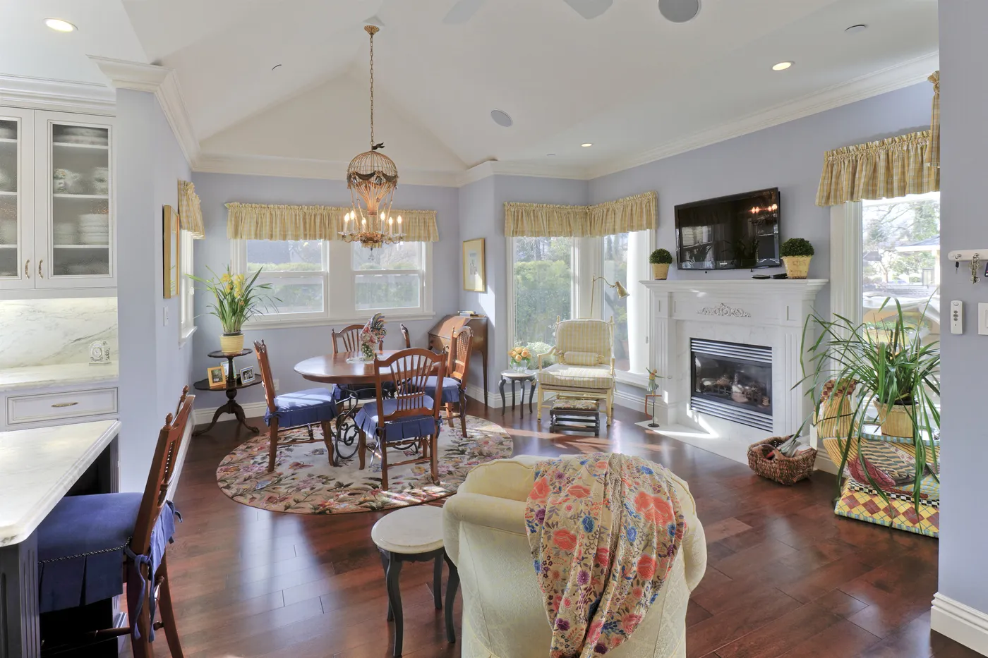 Breakfast table in the bay beside the family room fireplace