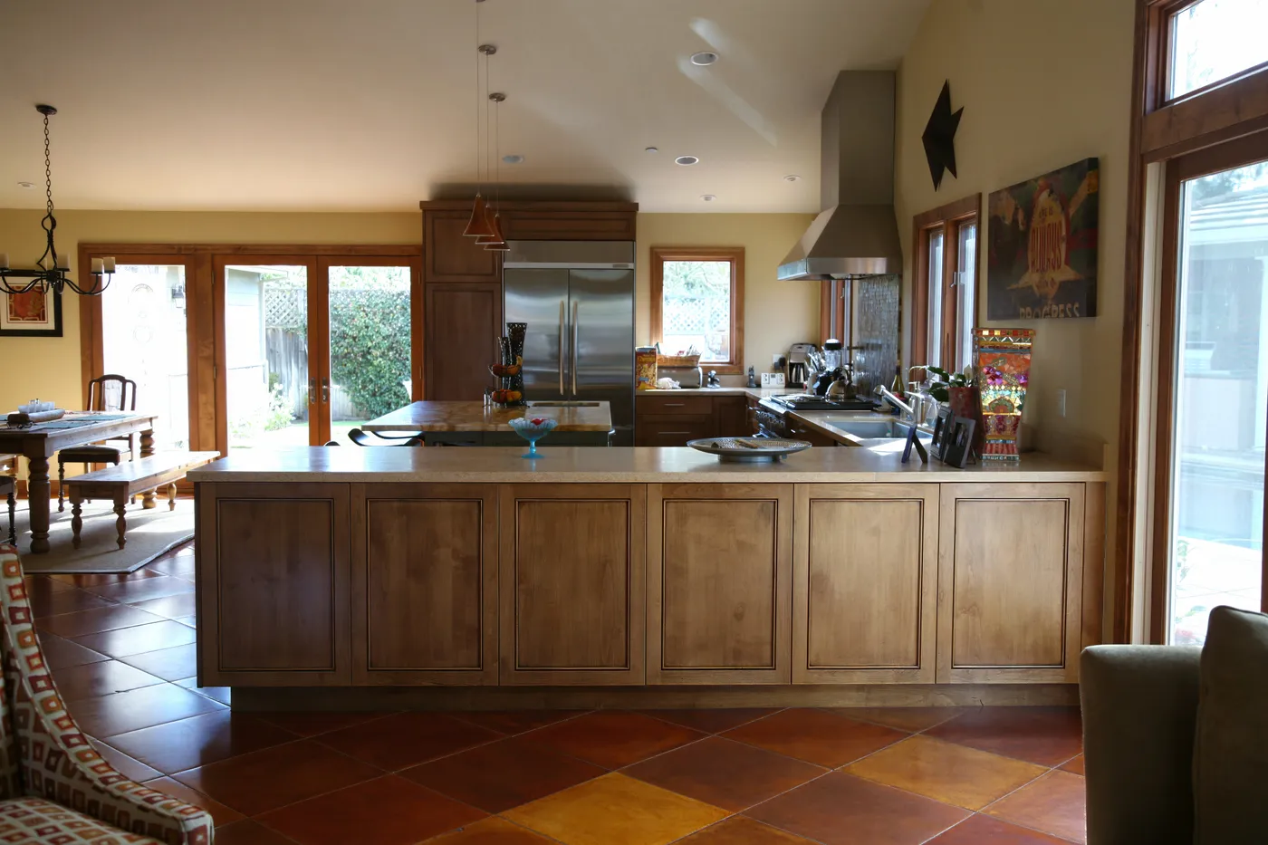 The kitchen seen across the counter from the dining end of the room